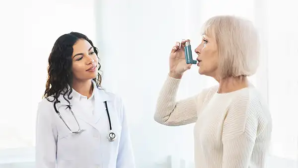 Elderly Woman Inhaler